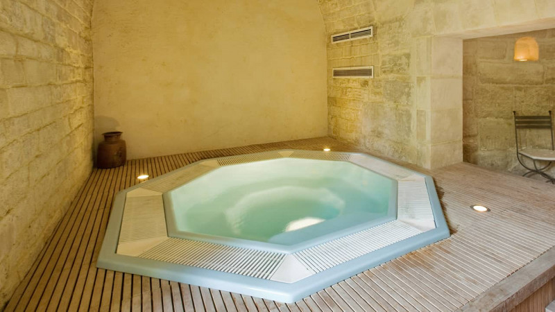 Spa à débordement / Spa envoûté : spa à débordement octogonale encastré blanc bois détente esprit piscine03